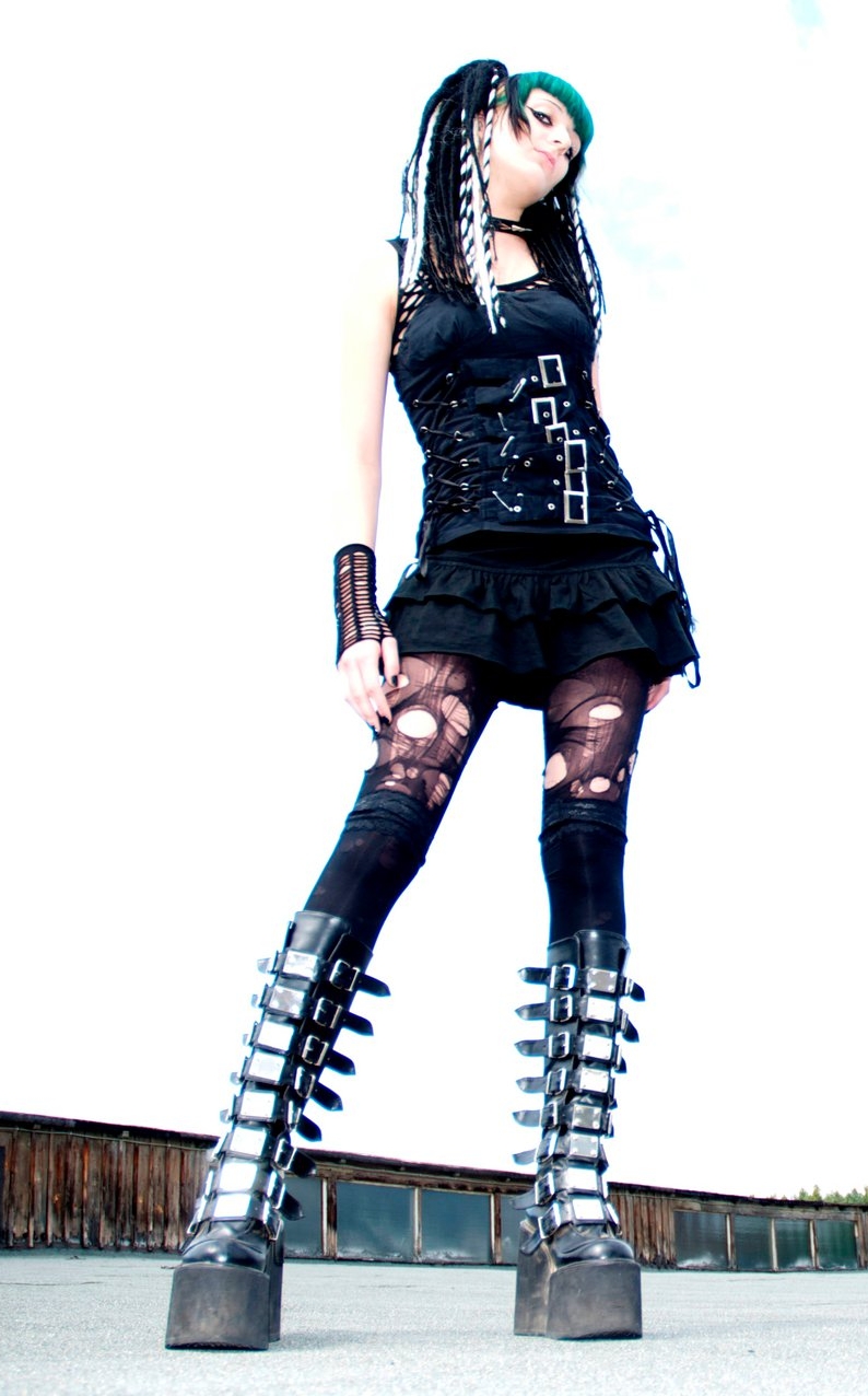 Brunette Gothic Girl wearing Black Sheer Ripped Pantyhose and Black Short Dress